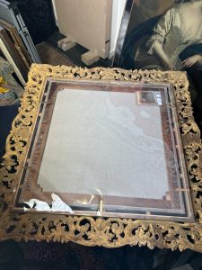 Painting fitted on frame and framing upgraded.