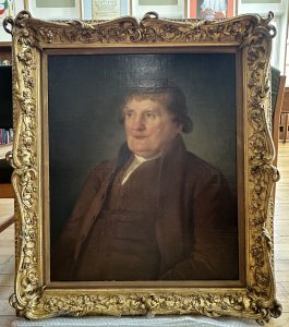 Painting fitted on frame.